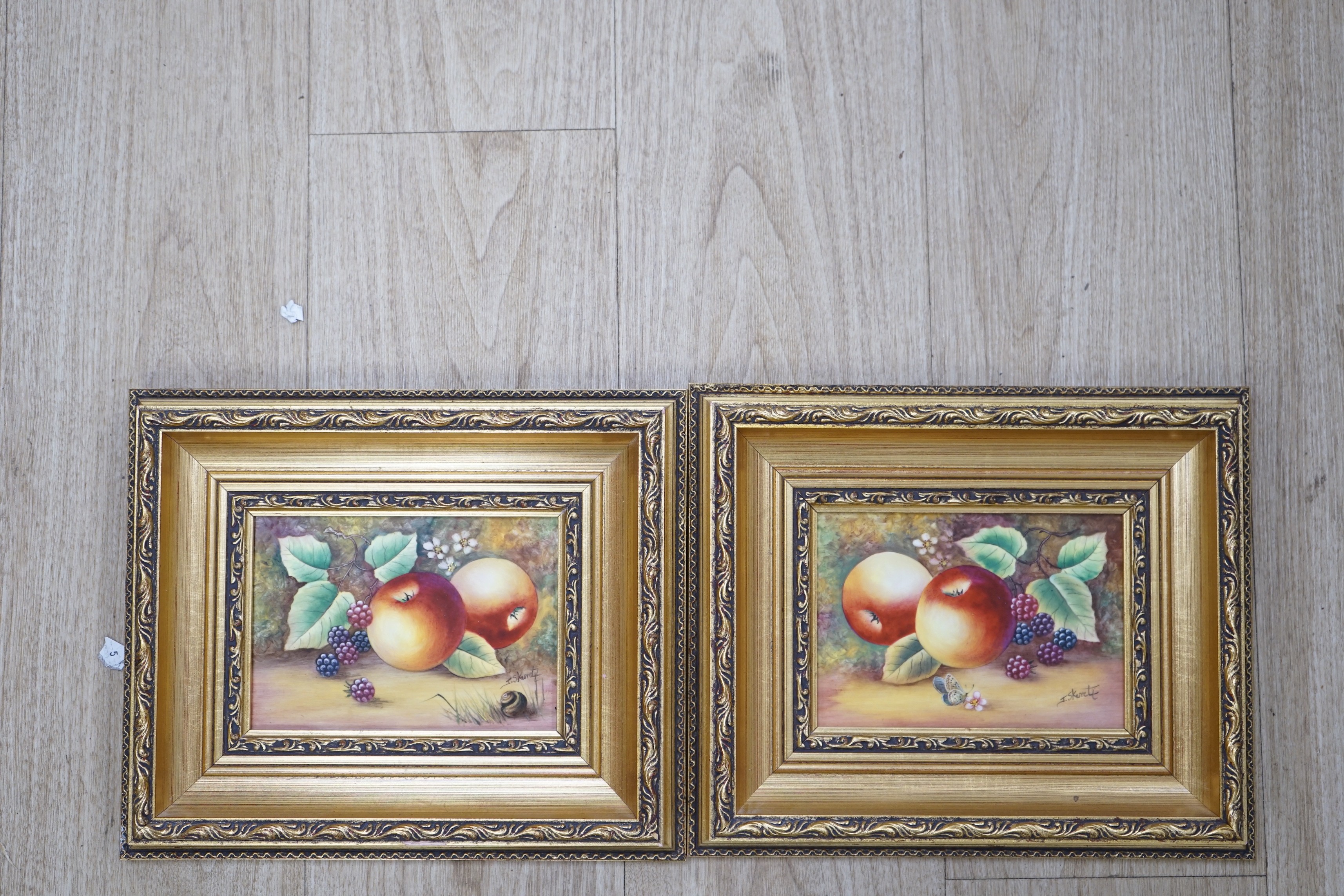 James Skerrett (Royal Worcester artist), pair of hand painted porcelain plaques, Still lifes of fruit, signed, 12 x 17cm